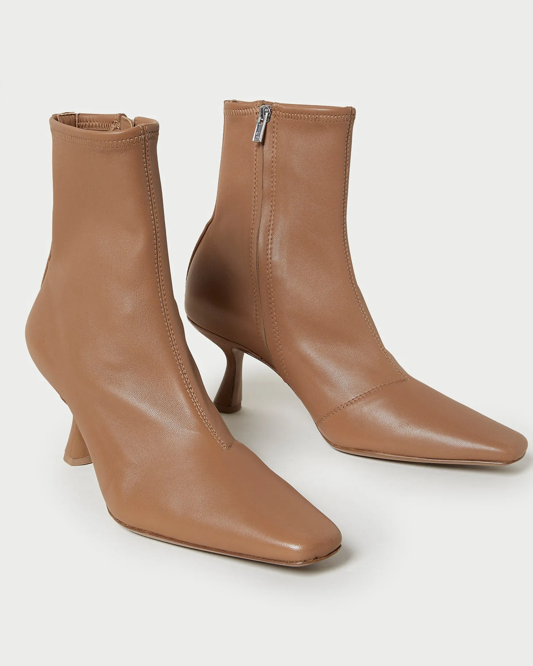 Thandy Black Curved Heel Bootie