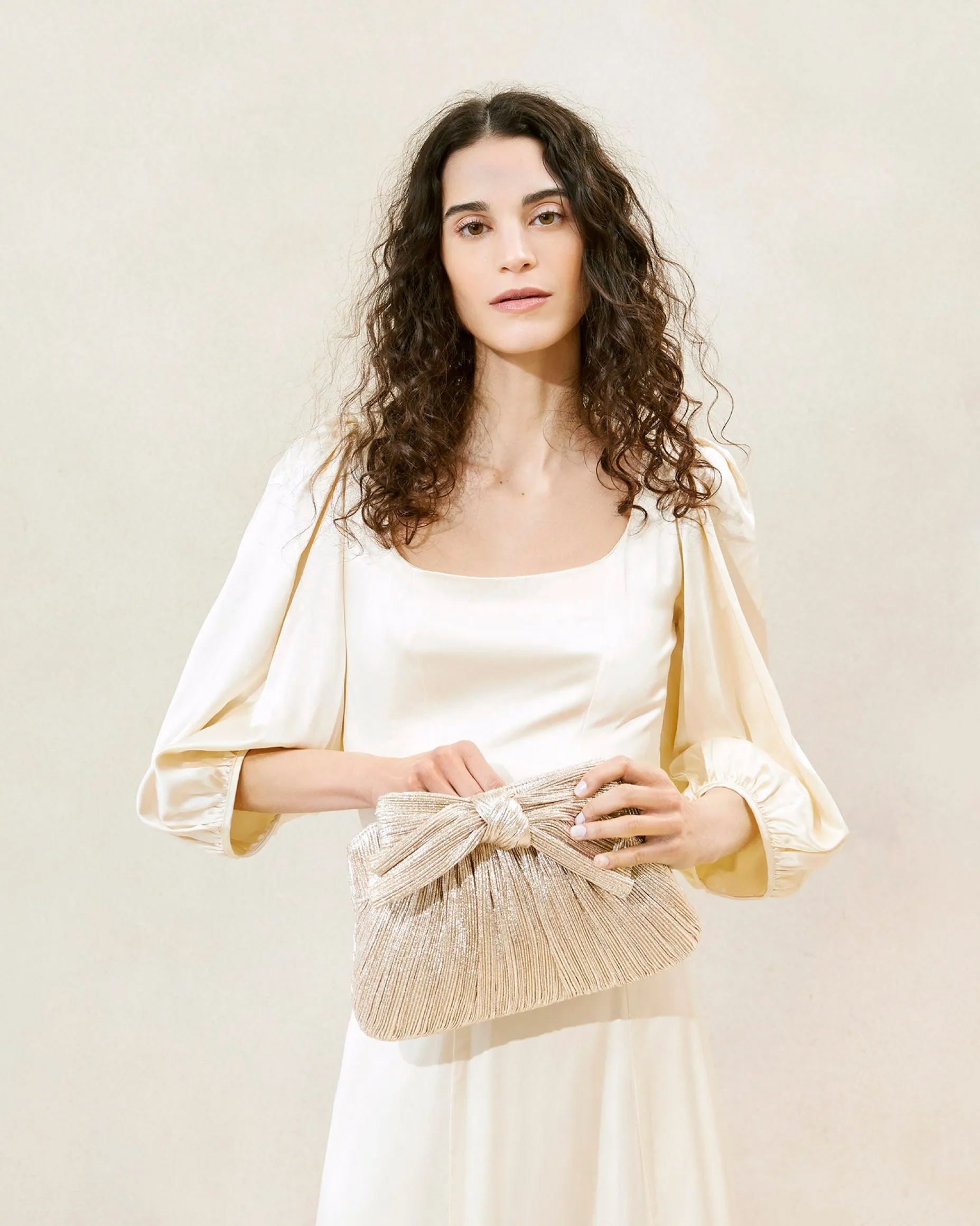 Rayne Gold Bow Clutch